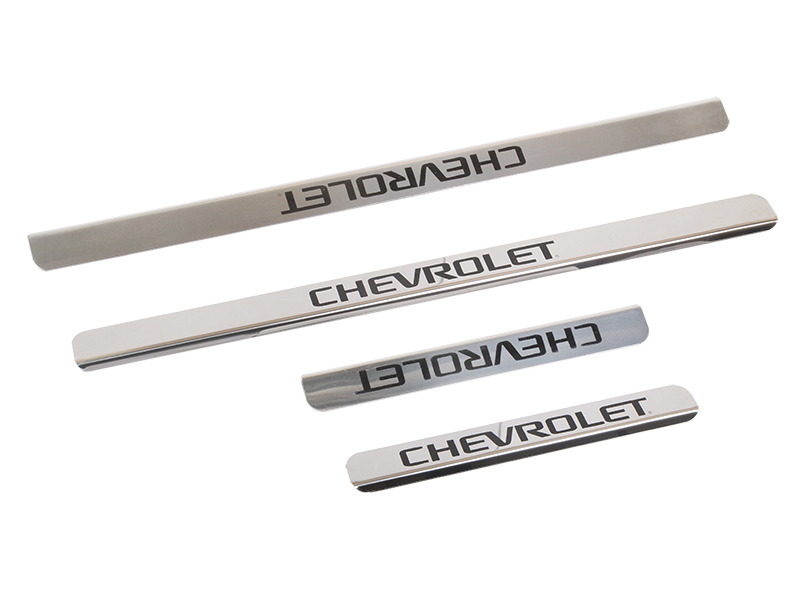 DOLLEX - Накладки внутренних порогов chevrolet aveo (<-2013), lacetti, lanos, niva (нерж.) надпись(к-т 4 шт.)
