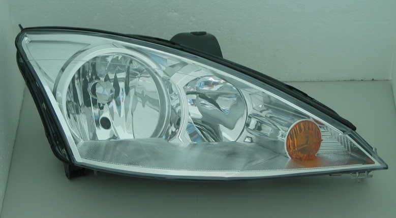 TYC - Фара правая FORD FOCUS 2002-2004  ELECTRIC WO MOTOR