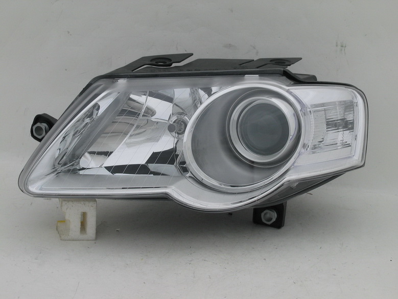 TYC - Фара правая VOLKSWAGEN PASSAT 2005    ELECTRIC WMOTOR